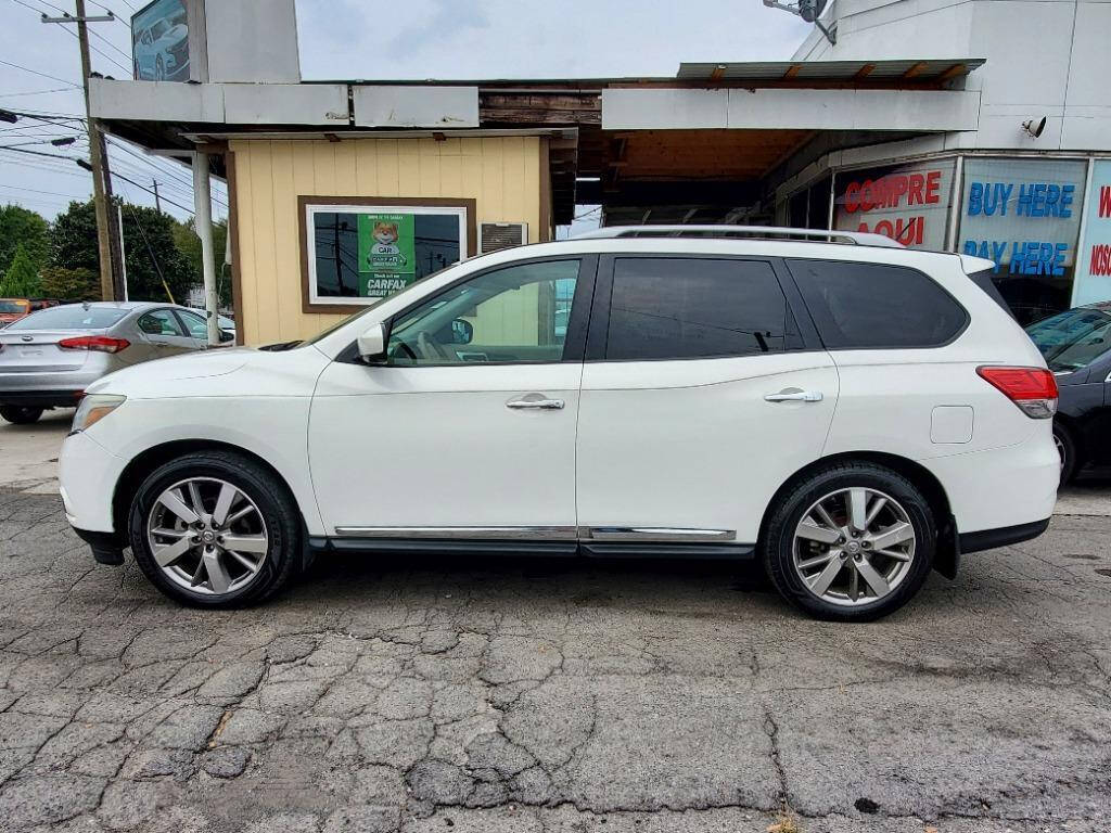 2014 Nissan Pathfinder for sale at DAGO'S AUTO SALES LLC in Dalton, GA