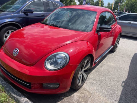 2012 Volkswagen Beetle for sale at STL Automotive Group in O'Fallon MO