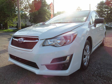 2015 Subaru Impreza for sale at CARS FOR LESS OUTLET in Morrisville PA