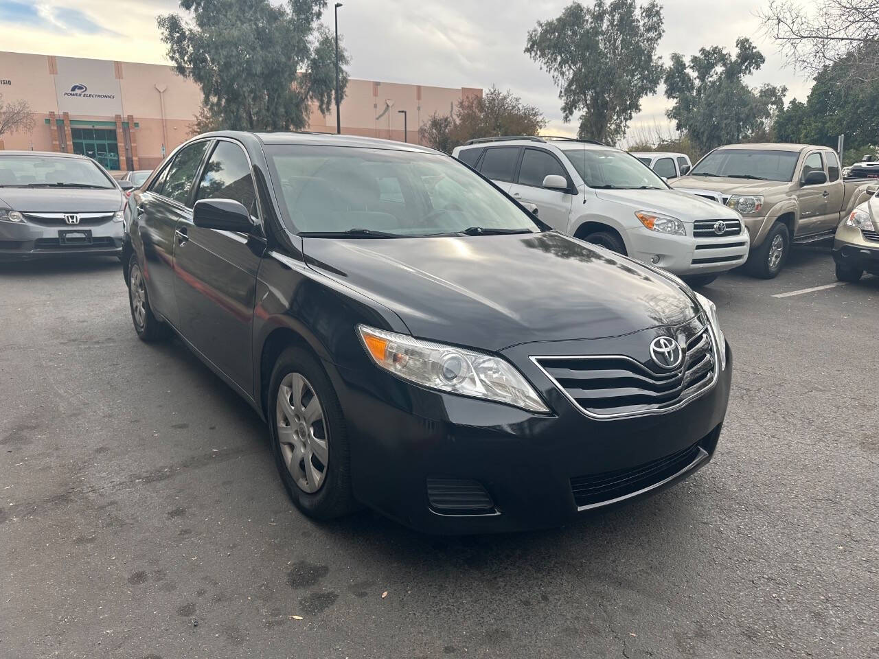 2010 Toyota Camry for sale at HUDSONS AUTOS in Gilbert, AZ