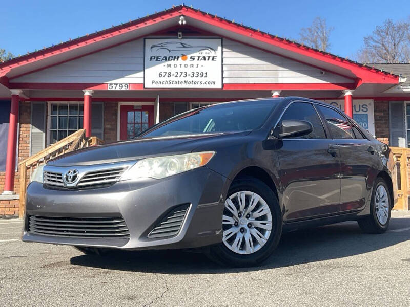 2014 Toyota Camry for sale at Peach State Motors Inc in Acworth GA