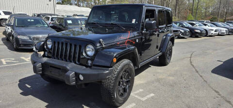 2016 Jeep Wrangler Unlimited for sale at GEORGIA AUTO DEALER LLC in Buford GA