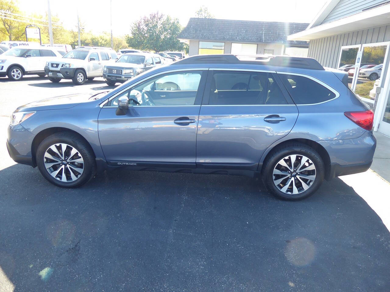 2017 Subaru Outback for sale at Lakeshore Autos in Holland, MI