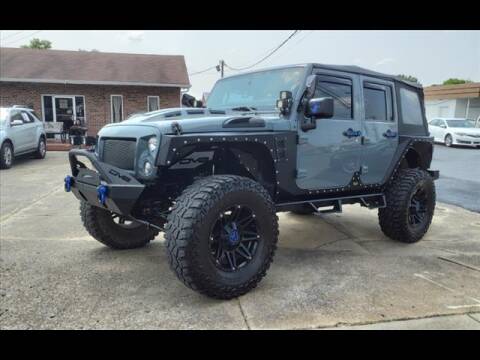 2014 Jeep Wrangler Unlimited for sale at Ernie Cook and Son Motors in Shelbyville TN