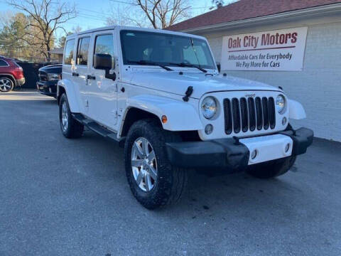 2016 Jeep Wrangler Unlimited for sale at Oak City Motors in Garner NC