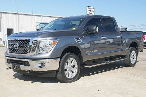 2018 Nissan Titan XD for sale at STRICKLAND AUTO GROUP INC in Ahoskie NC