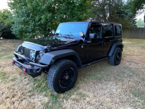 2013 Jeep Wrangler Unlimited for sale at Boston Auto Cars in Dedham MA