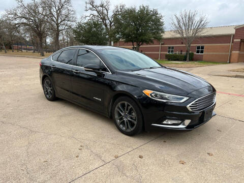 2017 Ford Fusion Hybrid for sale at Pitt Stop Detail & Auto Sales in College Station TX