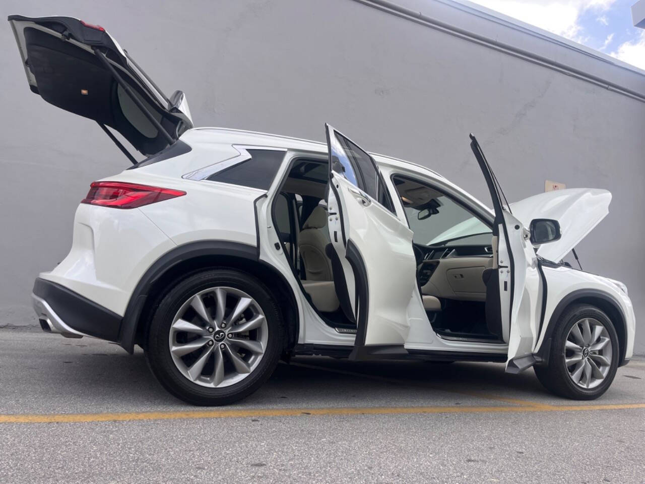 2021 INFINITI QX50 for sale at M & J UNITED AUTO SALES in LAUDERDALE LAKES, FL