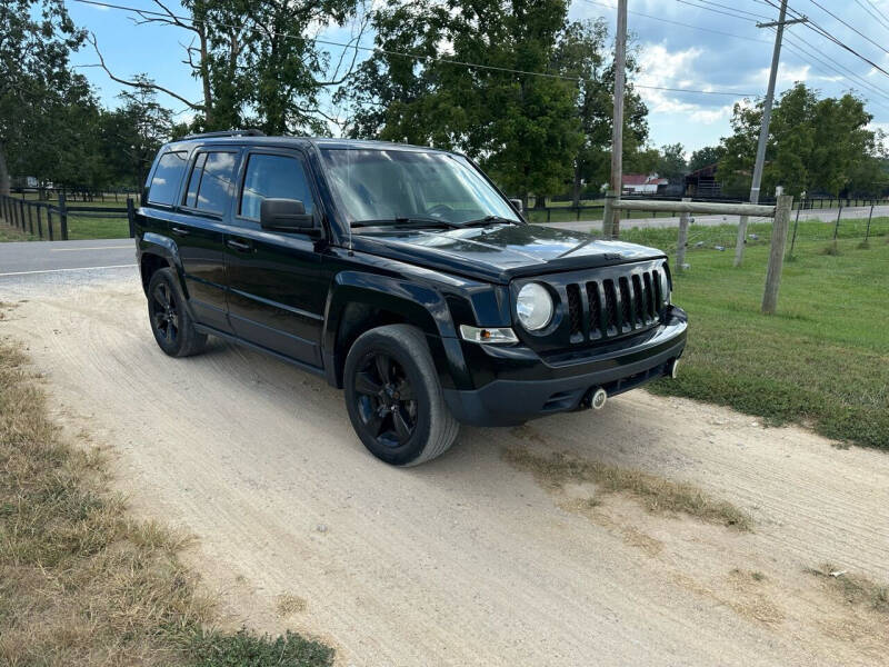 2014 Jeep Patriot for sale at TRAVIS AUTOMOTIVE in Corryton TN