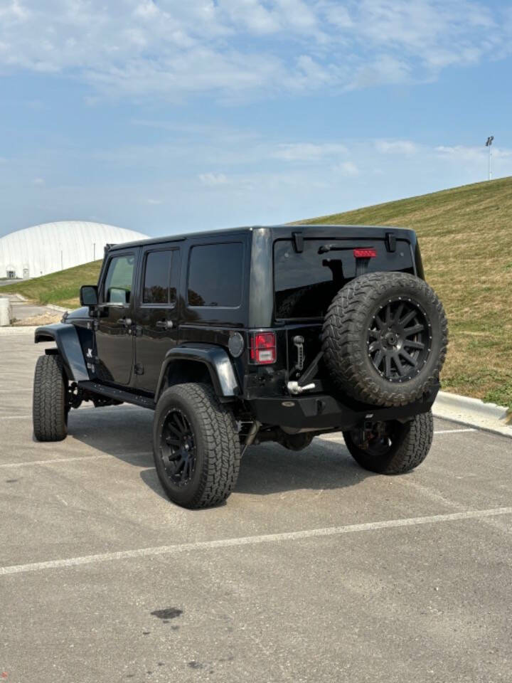 2015 Jeep Wrangler Unlimited for sale at GHOST AUTOWERKZ in Northbrook, IL