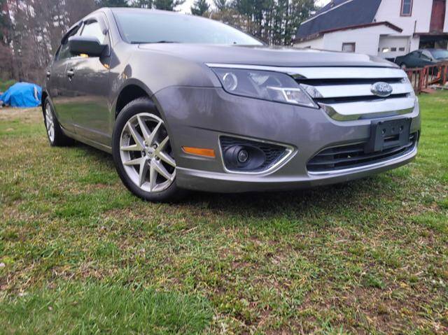 2010 Ford Fusion for sale at J & E AUTOMALL in Pelham NH
