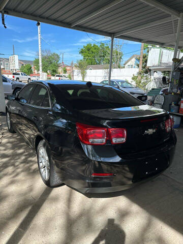 2013 Chevrolet Malibu for sale at De La Paz Auto Sales Inc. in Houston TX