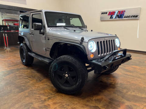 2014 Jeep Wrangler for sale at Driveline LLC in Jacksonville FL