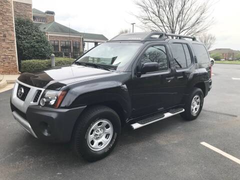 2012 Nissan Xterra for sale at Empire Auto Group in Cartersville GA