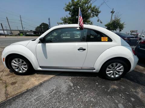 2015 Volkswagen Beetle for sale at FAMILY AUTO CENTER in Greenville NC