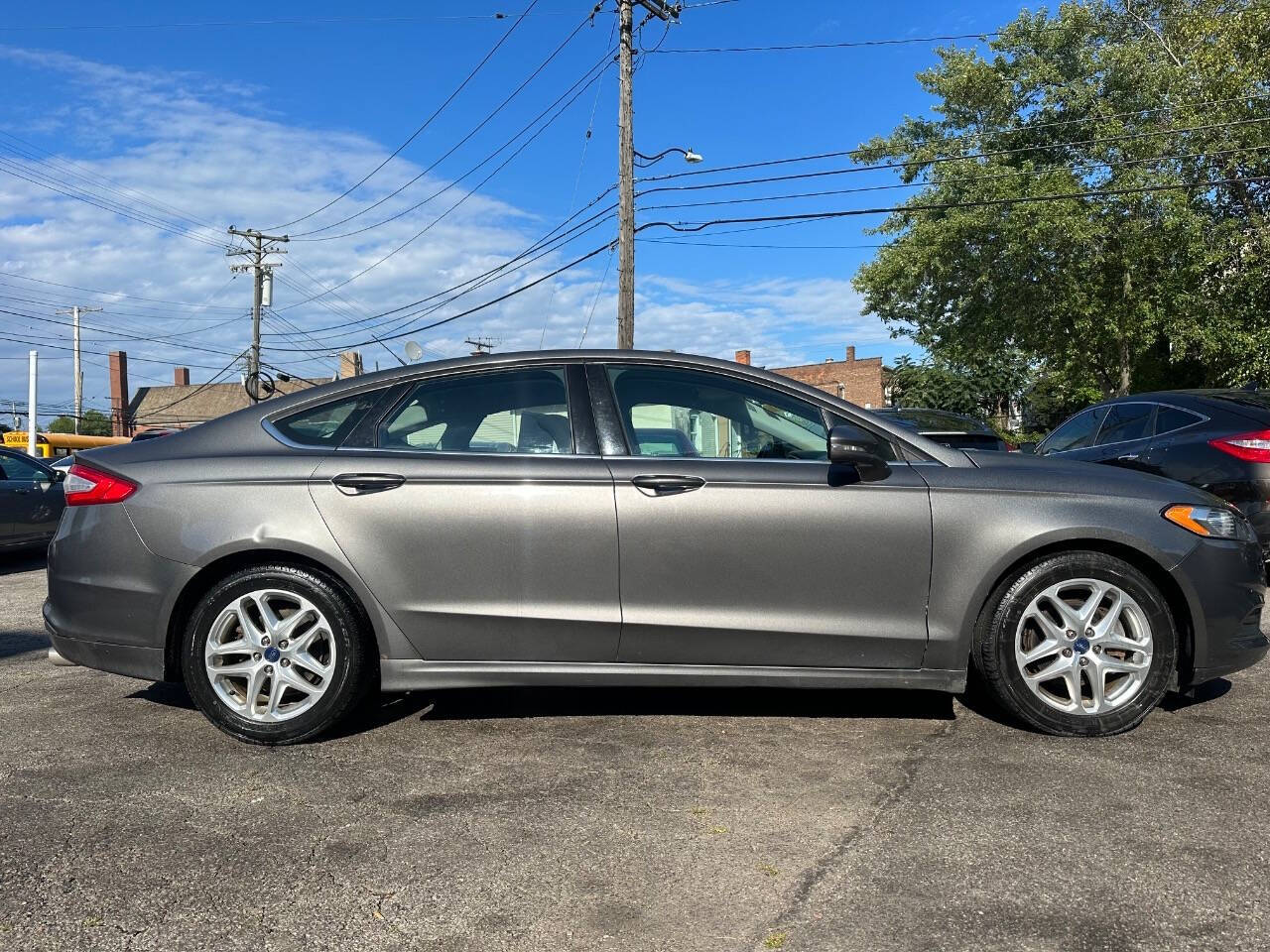 2013 Ford Fusion for sale at Kelly Auto Group in Cleveland, OH