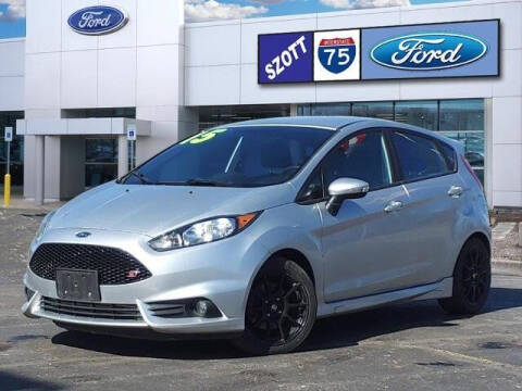 2015 Ford Fiesta for sale at Szott Ford in Holly MI