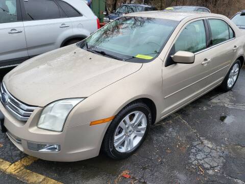 2007 Ford Fusion for sale at Howe's Auto Sales in Lowell MA