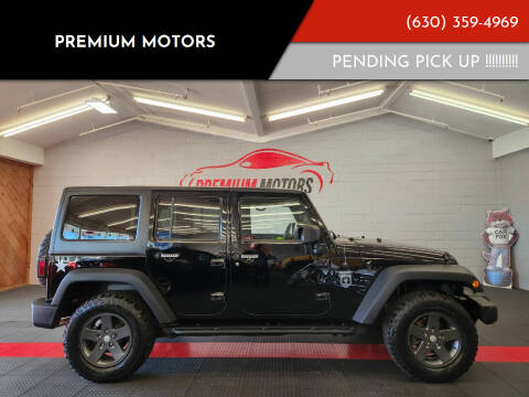 2011 Jeep Wrangler Unlimited for sale at Premium Motors in Villa Park IL