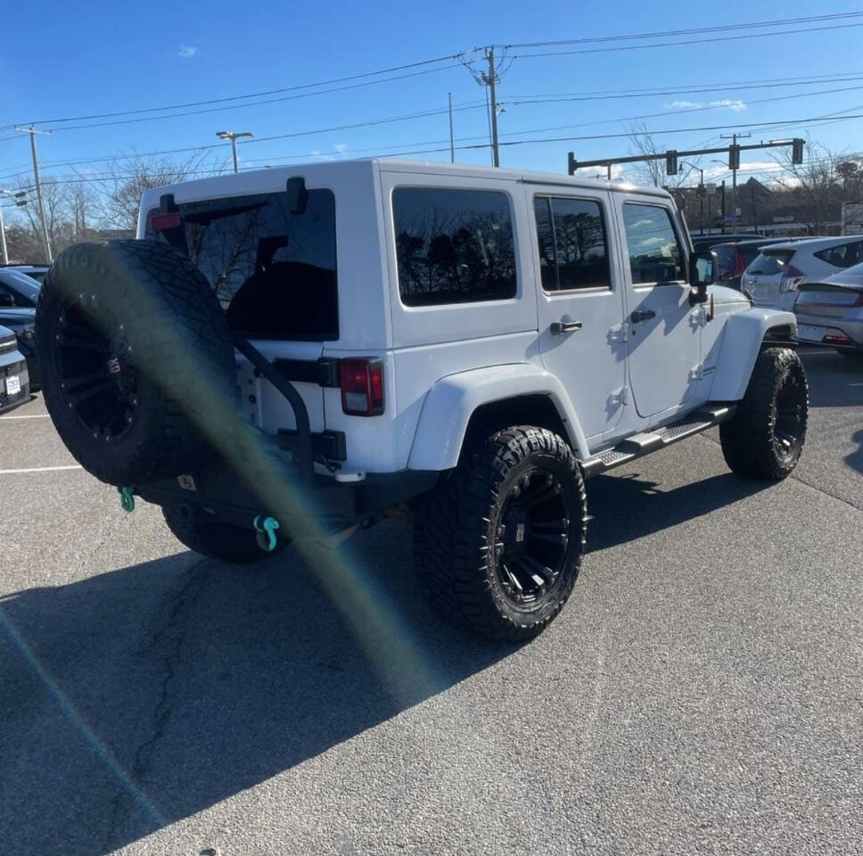 2015 Jeep Wrangler Unlimited for sale at JM4 Auto in Webster, NY