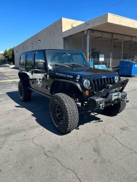 2011 Jeep Wrangler Unlimited for sale at Pur Motors in Glendale CA