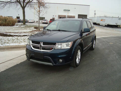 2013 Dodge Journey for sale at ARIANA MOTORS INC in Addison IL