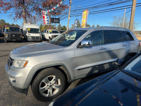 2011 Jeep Grand Cherokee for sale at King Auto Sales INC in Medford NY