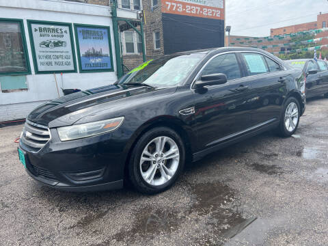 2015 Ford Taurus for sale at Barnes Auto Group in Chicago IL