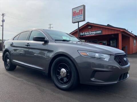 2015 Ford Taurus for sale at HUFF AUTO GROUP in Jackson MI