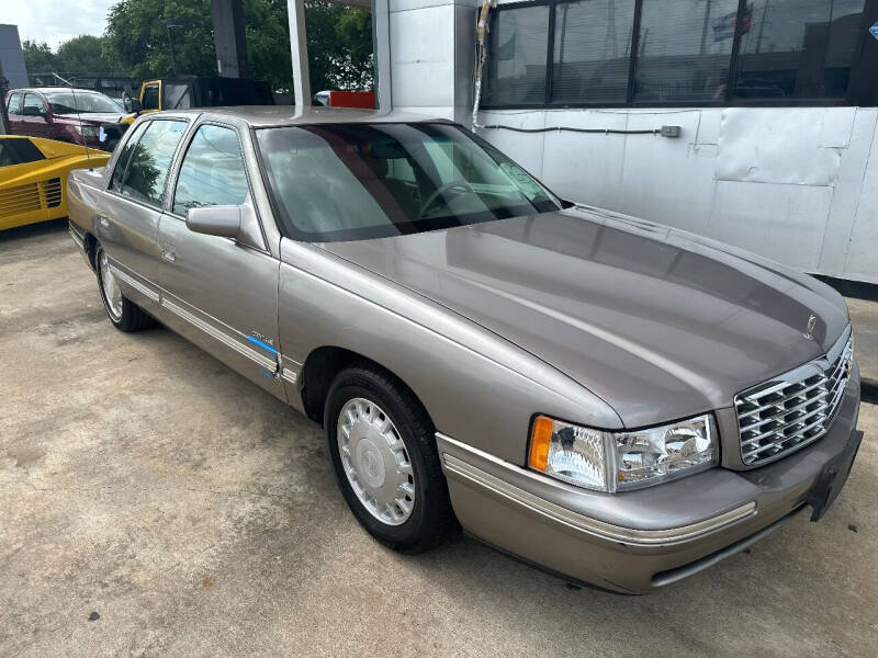 1997 Cadillac DeVille for sale at Buy-Fast Autos in Houston TX