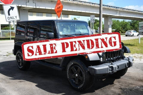 2016 Jeep Wrangler Unlimited for sale at STS Automotive - MIAMI in Miami FL