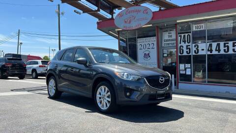 2014 Mazda CX-5 for sale at The Carriage Company in Lancaster OH