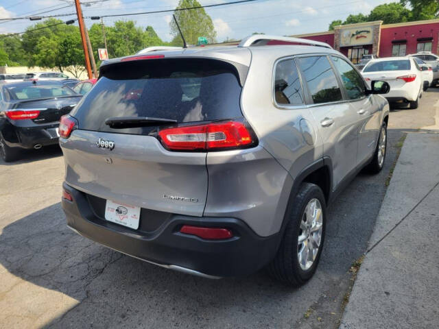 2014 Jeep Cherokee for sale at DAGO'S AUTO SALES LLC in Dalton, GA