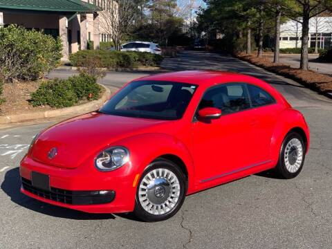 2014 Volkswagen Beetle for sale at Triangle Motors Inc in Raleigh NC
