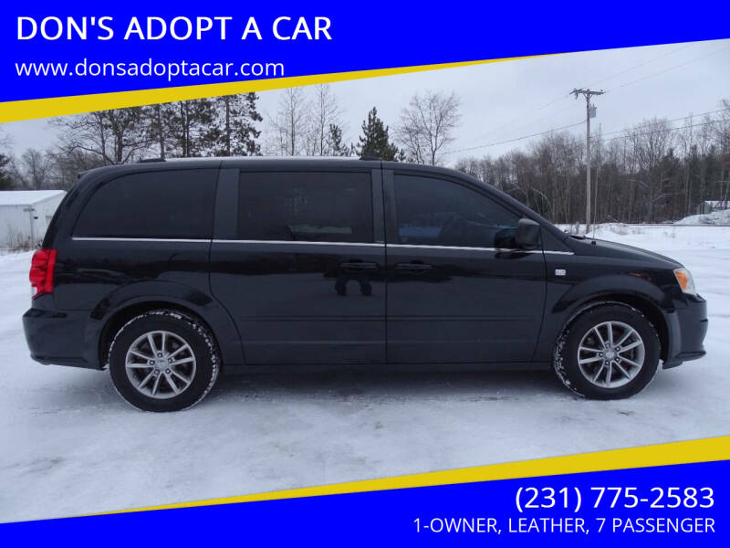 2014 Dodge Grand Caravan for sale at DON'S ADOPT A CAR in Cadillac MI