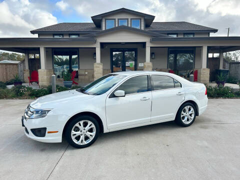 2012 Ford Fusion for sale at Car Country in Clute TX