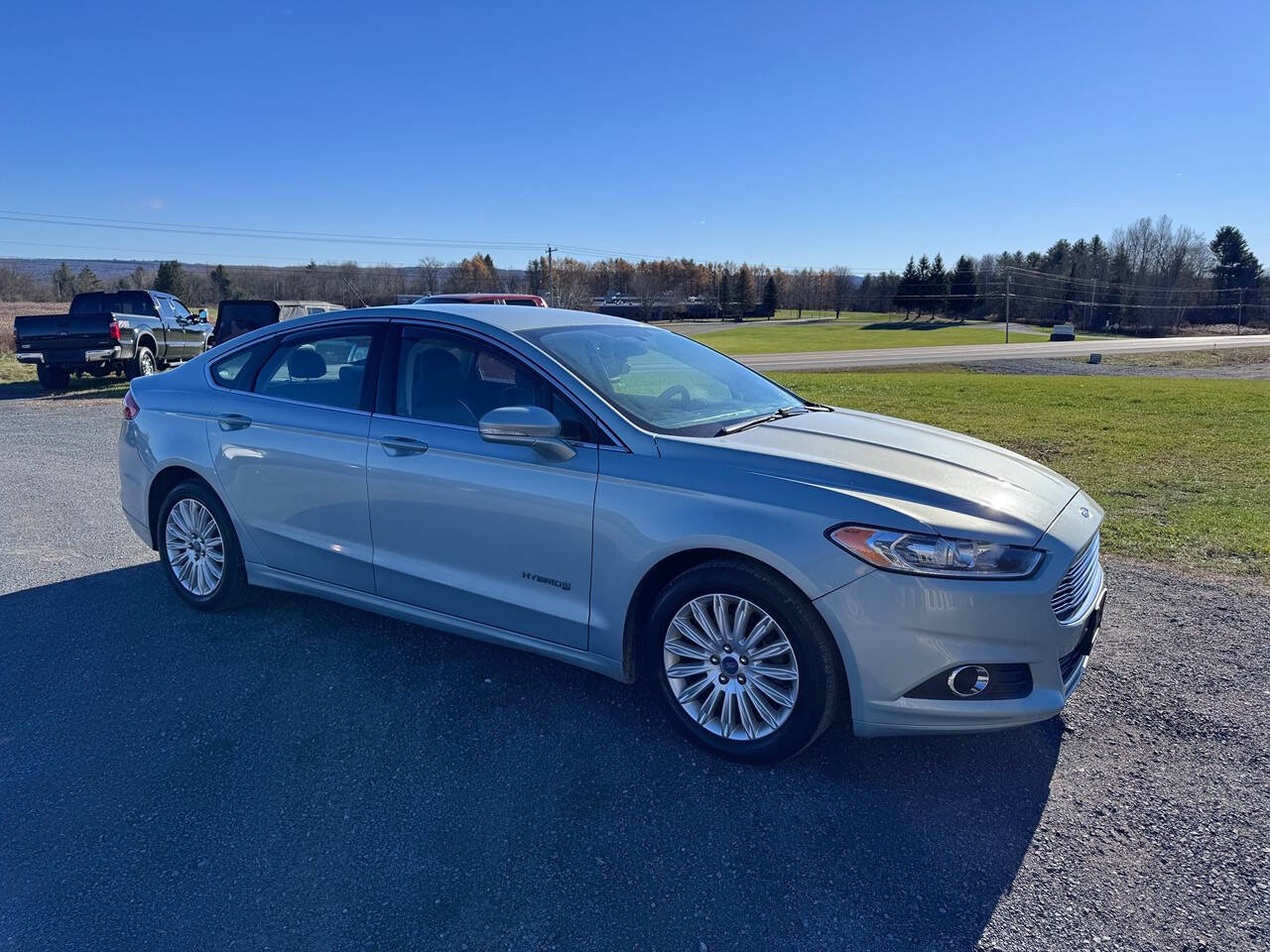 2014 Ford Fusion Hybrid for sale at Riverside Motors in Glenfield, NY