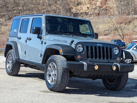 2014 Jeep Wrangler Unlimited for sale at Seibel's Auto Warehouse in Freeport PA