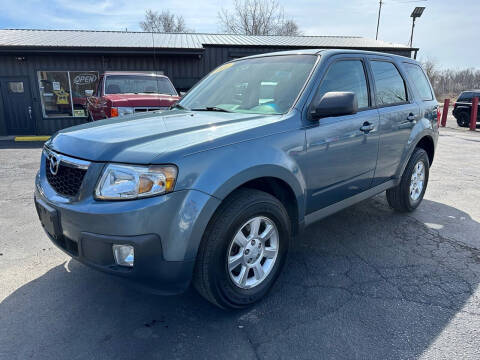 2011 Mazda Tribute for sale at VILLAGE AUTO MART LLC in Portage IN