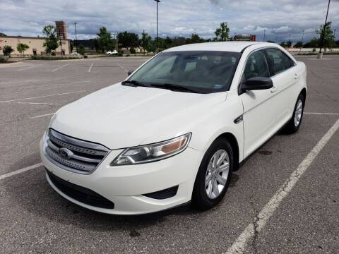 2010 Ford Taurus for sale at Auto Hub in Grandview MO