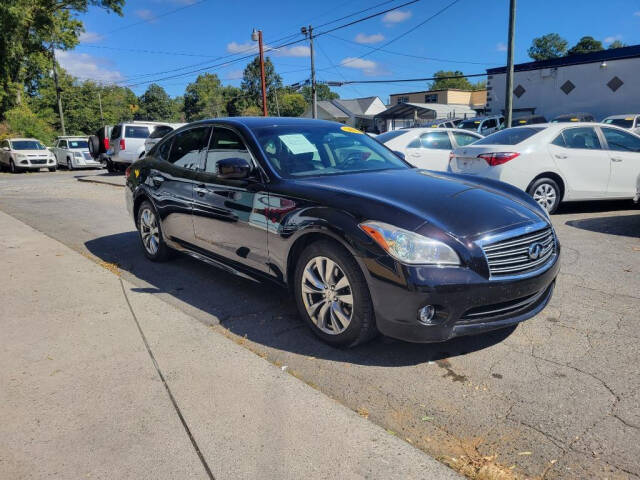 2013 INFINITI M37 for sale at DAGO'S AUTO SALES LLC in Dalton, GA