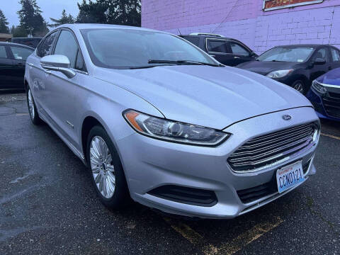 2016 Ford Fusion Hybrid for sale at SNS AUTO SALES in Seattle WA