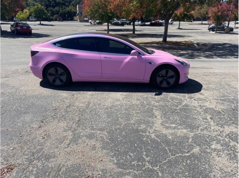 pink tesla for sale