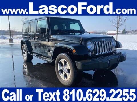 2016 Jeep Wrangler Unlimited for sale at Lasco of Grand Blanc in Grand Blanc MI