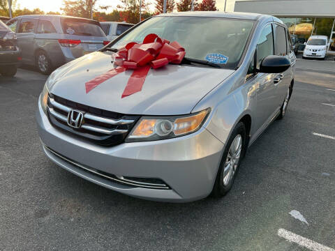 2014 Honda Odyssey for sale at Charlotte Auto Group, Inc in Monroe NC