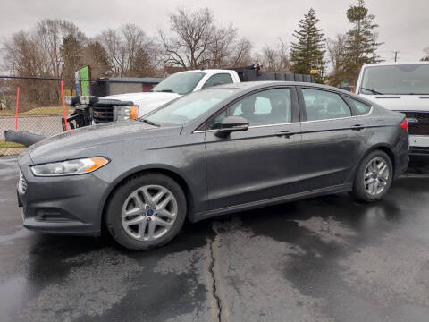 2016 Ford Fusion for sale at Jim Douglas Auto Sales in Pontiac MI