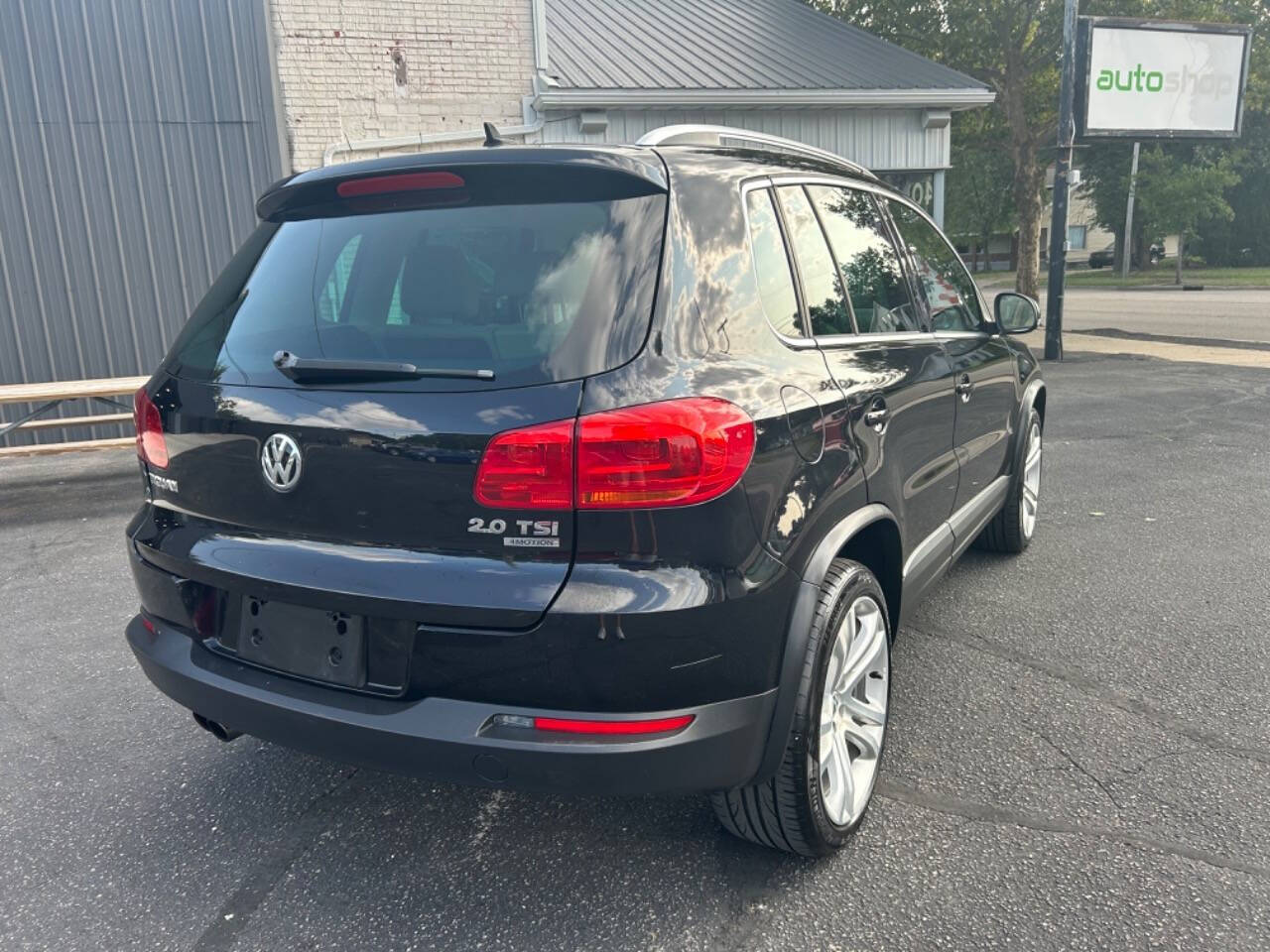 2013 Volkswagen Tiguan for sale at Auto Shop in Wyoming, MI