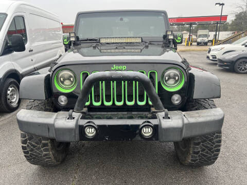 2014 Jeep Wrangler Unlimited for sale at BRYANT AUTO SALES in Bryant AR