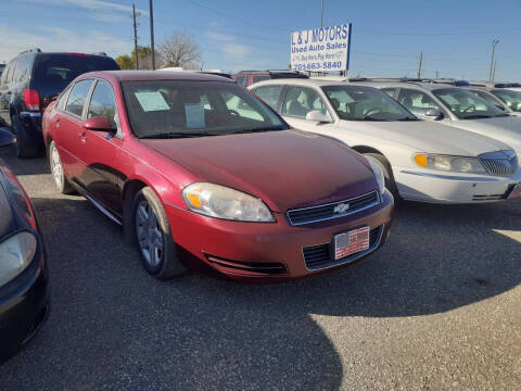 2011 Chevrolet Impala for sale at L & J Motors in Mandan ND